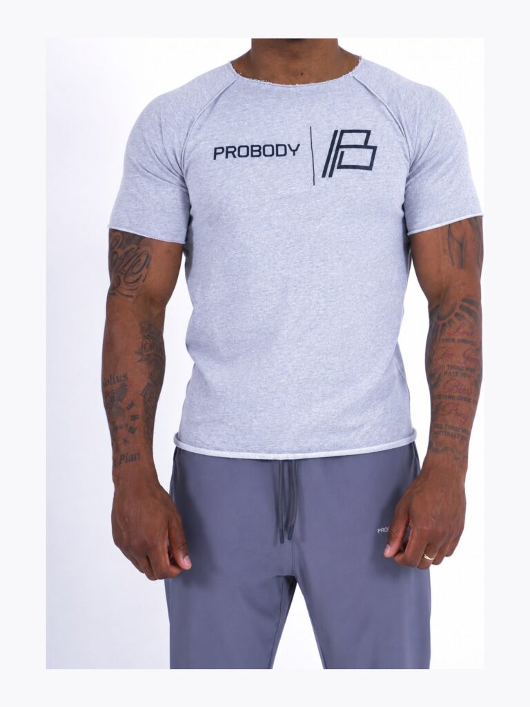 Man wearing the grey marl ProBody core logo T-shirt with grey joggers, the PROBODY B-mark chest print visible